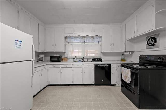 kitchen with white cabinets, sink, and black appliances