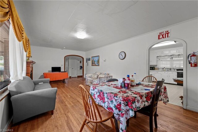 dining room with light wood-type flooring