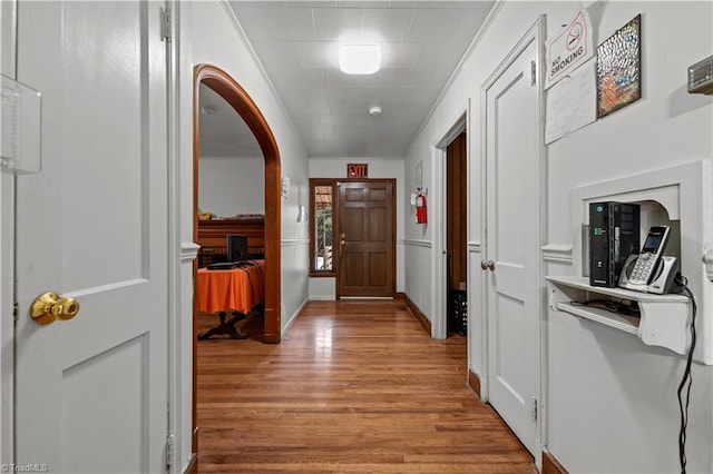 corridor with light wood-type flooring