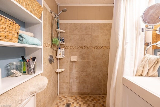 full bath featuring a tile shower