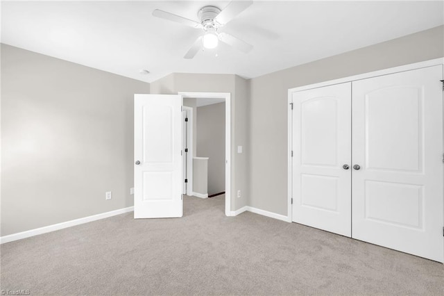 6107 Hanes Way, Clemmons, NC 27012 - unfurnished bedroom featuring carpet, a closet, and a ceiling fan