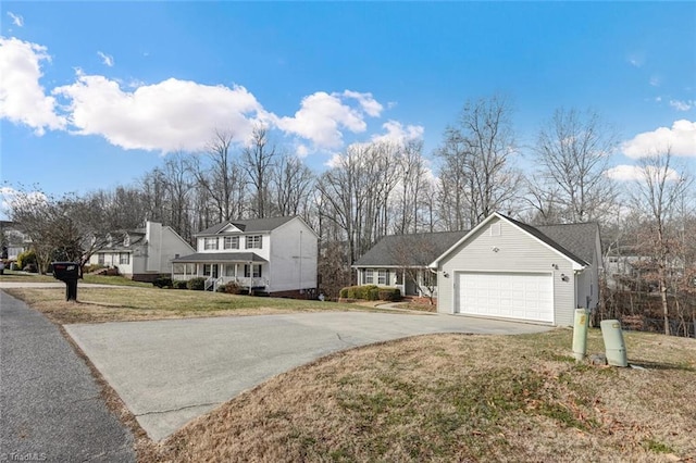 view of front of home featuring a front lawn and a garage