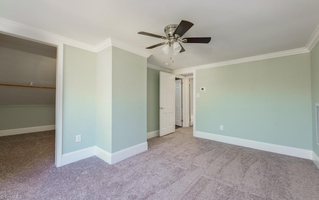 unfurnished bedroom featuring light carpet, ceiling fan, and ornamental molding