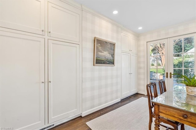 interior space featuring french doors and dark hardwood / wood-style flooring