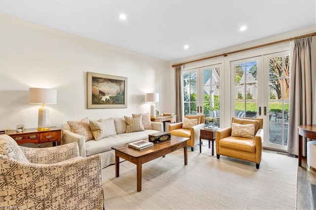 living room with french doors and ornamental molding