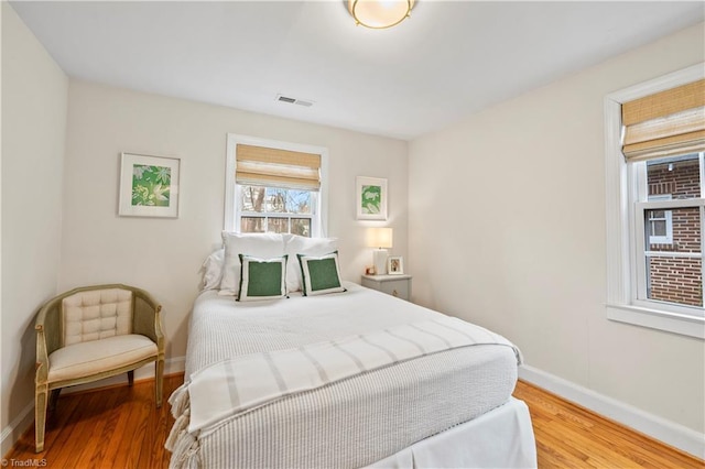 bedroom featuring hardwood / wood-style floors