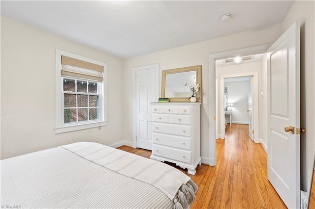 bedroom featuring light wood-type flooring