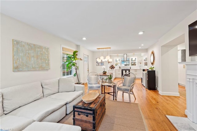 living room with light hardwood / wood-style flooring