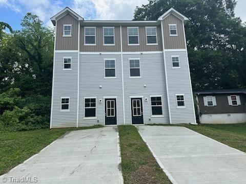 711 Fairview St, High Point, NC 27260 - view of front of house featuring driveway and a front yard