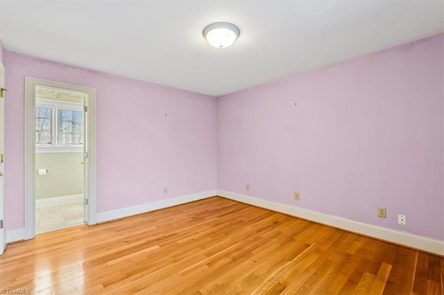 unfurnished room featuring light hardwood / wood-style floors