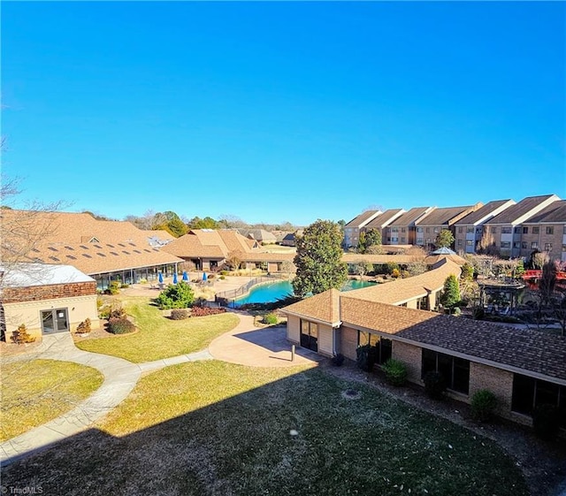 drone / aerial view with a residential view