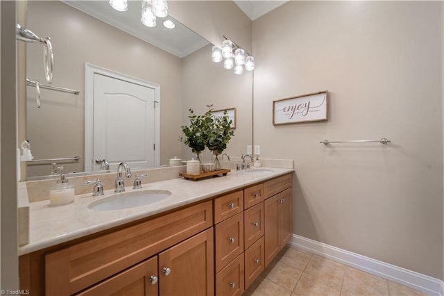 bathroom with tile patterned flooring, ornamental molding, double vanity, and a sink