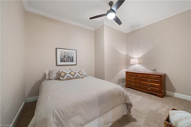 carpeted bedroom with baseboards, ceiling fan, and crown molding