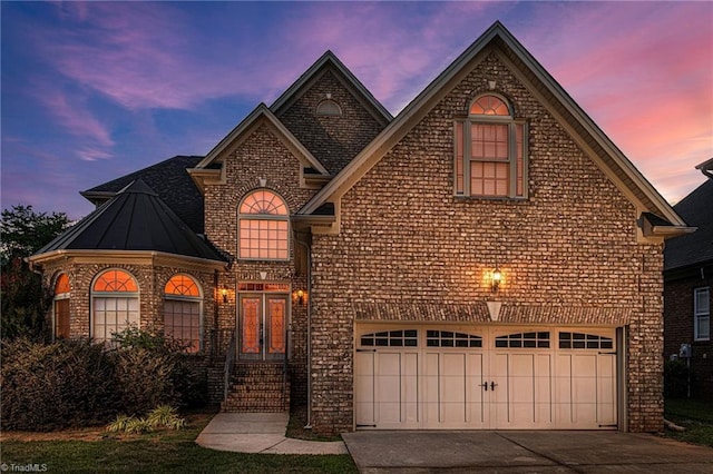 view of front of property featuring a garage