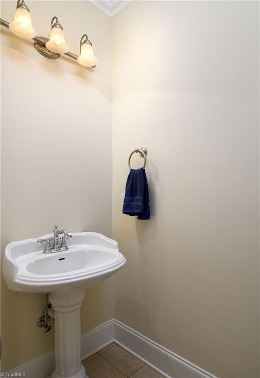 bathroom with tile patterned flooring