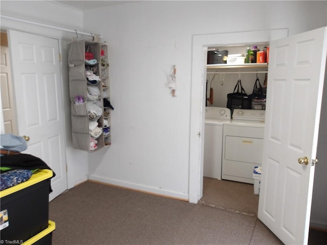 bedroom featuring washing machine and clothes dryer and carpet flooring