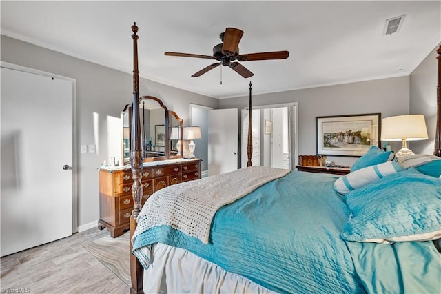 bedroom featuring ceiling fan and crown molding