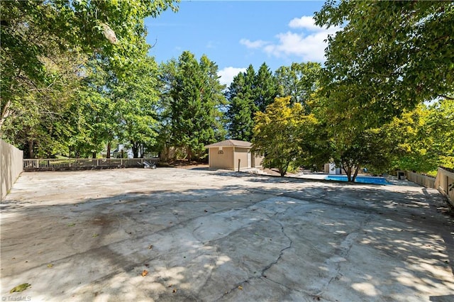 view of patio / terrace featuring a shed