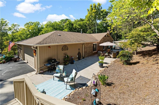 ranch-style home featuring a garage