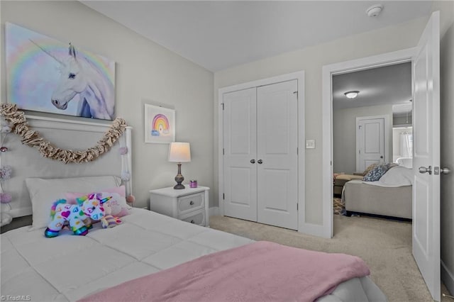 carpeted bedroom featuring a closet