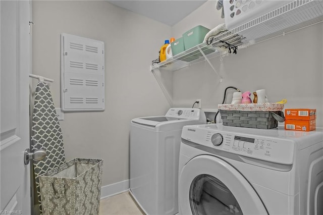 laundry room featuring washing machine and dryer