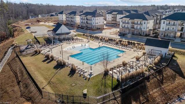 view of swimming pool with a patio area