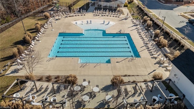 view of swimming pool featuring a patio