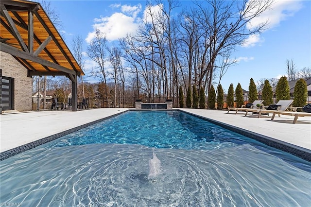 view of pool with a patio area, fence, and a fenced in pool