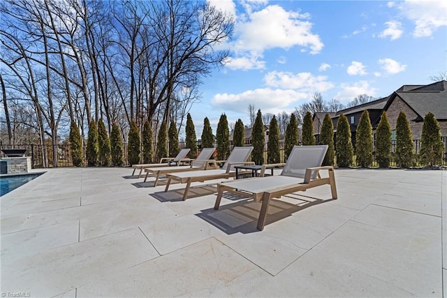 view of patio with fence