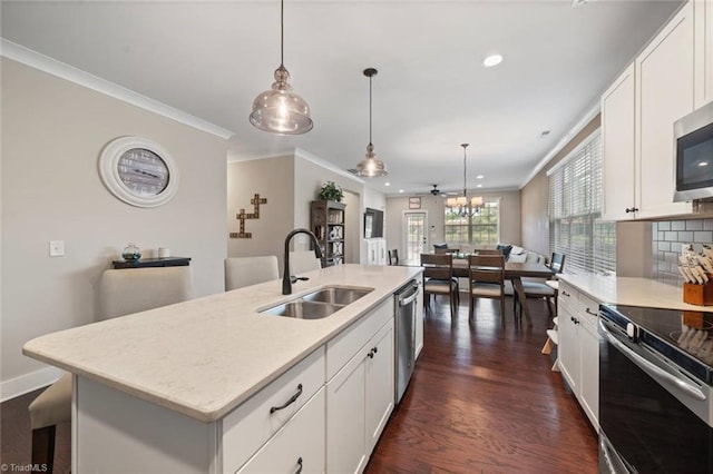 1423 Blooming Mountain Way, Kernersville, NC 27284 - kitchen with recessed lighting, a sink, dark wood-style floors, and stainless steel appliances