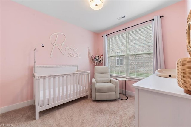 1423 Blooming Mountain Way, Kernersville, NC 27284 - bedroom with a nursery area, baseboards, visible vents, and light carpet