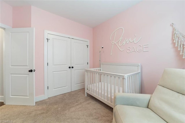 1423 Blooming Mountain Way, Kernersville, NC 27284 - carpeted bedroom featuring a crib, baseboards, and a closet