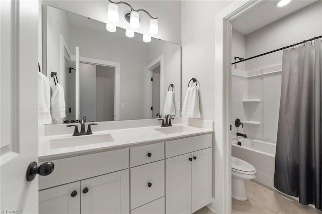 1423 Blooming Mountain Way, Kernersville, NC 27284 - bathroom featuring tile patterned flooring, double vanity, shower / bath combination with curtain, toilet, and a sink