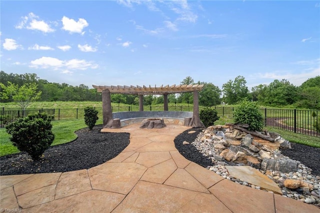 1423 Blooming Mountain Way, Kernersville, NC 27284 - view of patio with a fenced backyard, an outdoor fire pit, and a pergola