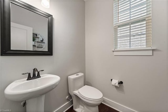 1423 Blooming Mountain Way, Kernersville, NC 27284 - bathroom with toilet, baseboards, and a sink