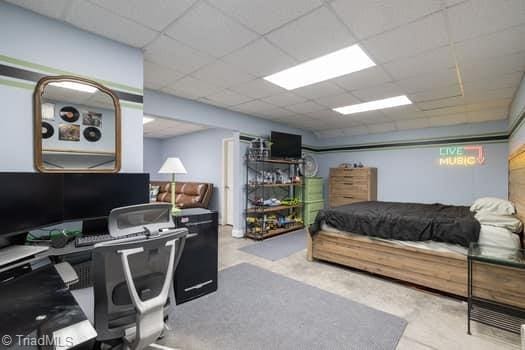 bedroom with a drop ceiling