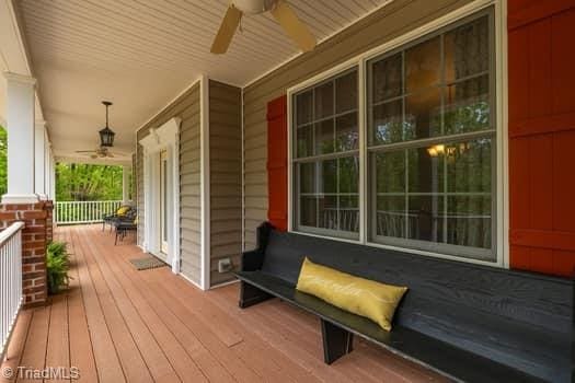 deck featuring ceiling fan and a porch