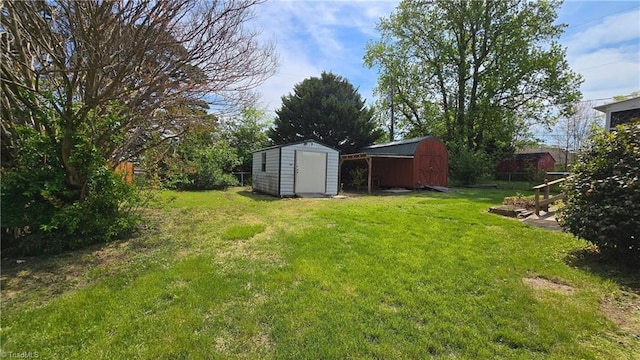 view of yard with a shed and an outdoor structure