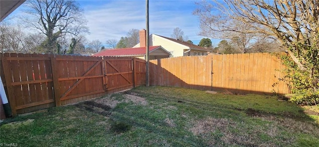 view of yard featuring a fenced backyard