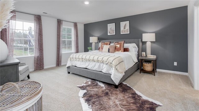162 W Farm Loop, Stokesdale, NC 27537 - carpeted bedroom with visible vents and baseboards