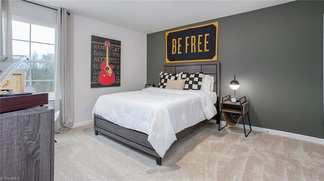 162 W Farm Loop, Stokesdale, NC 27537 - bedroom featuring carpet flooring and baseboards