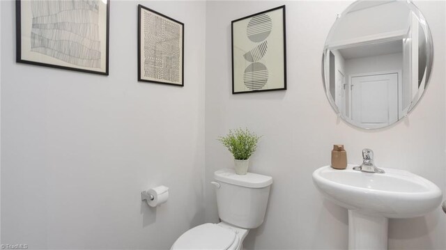 162 W Farm Loop, Stokesdale, NC 27537 - bathroom with a sink and toilet