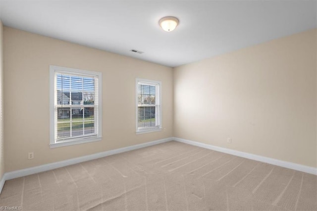 view of carpeted spare room