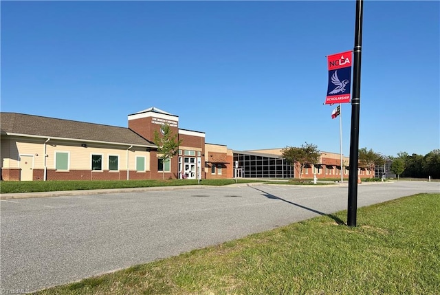 view of street with curbs