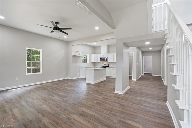 2500 Lomond St, Winston-Salem, NC 27127 - unfurnished living room featuring a ceiling fan, recessed lighting, and dark wood finished floors