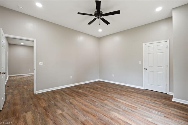 2500 Lomond St, Winston-Salem, NC 27127 - empty room featuring a ceiling fan, wood finished floors, recessed lighting, and a smoke detector