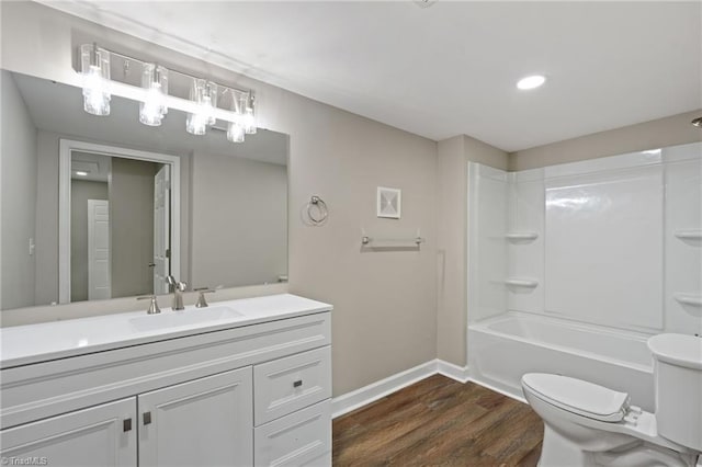 2500 Lomond St, Winston-Salem, NC 27127 - full bathroom featuring wood finished floors, vanity, bathing tub / shower combination, and recessed lighting