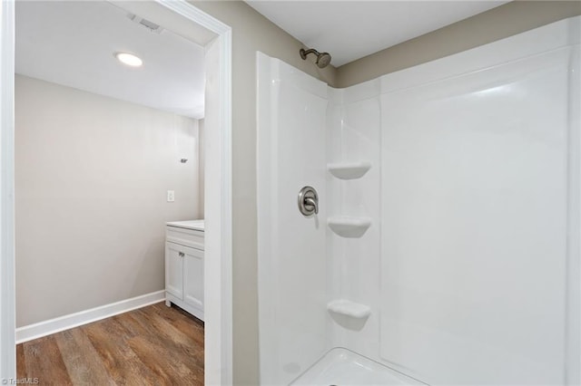 2500 Lomond St, Winston-Salem, NC 27127 - bathroom with a shower, wood finished floors, vanity, and recessed lighting