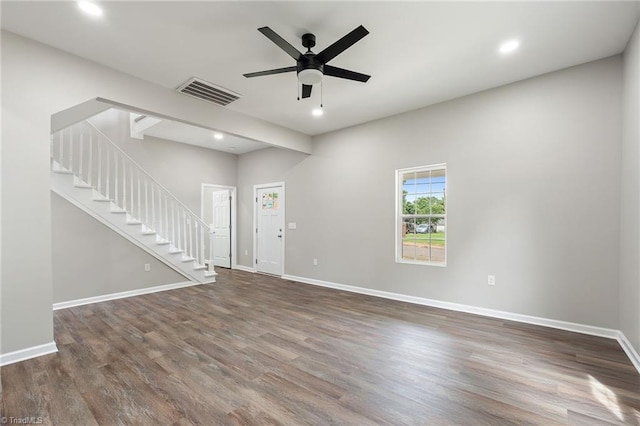 2500 Lomond St, Winston-Salem, NC 27127 - unfurnished living room with stairway, wood finished floors, ceiling fan, and recessed lighting