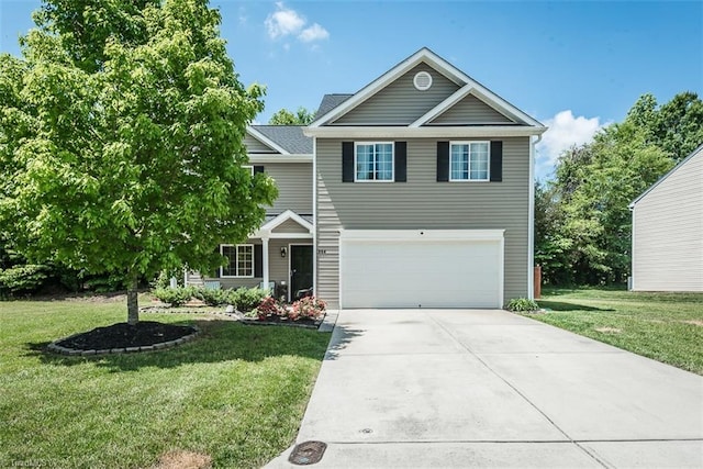 304 Walnut Crossing Dr, Whitsett, NC 27377 - traditional-style house featuring a garage, driveway, and a front yard